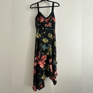 Great condition BCBG MaxAzria black & floral midi-length, asymmetrical hem dress